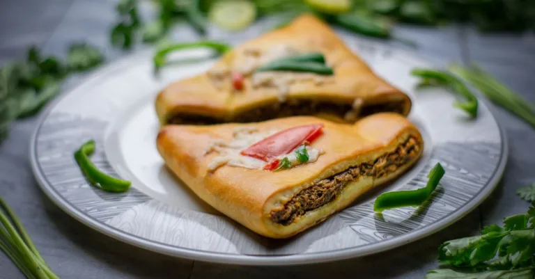 découvrez notre recette délicieuse de batbout farci, un pain marocain moelleux garni d'ingrédients savoureux, parfait pour un repas gourmand et convivial.